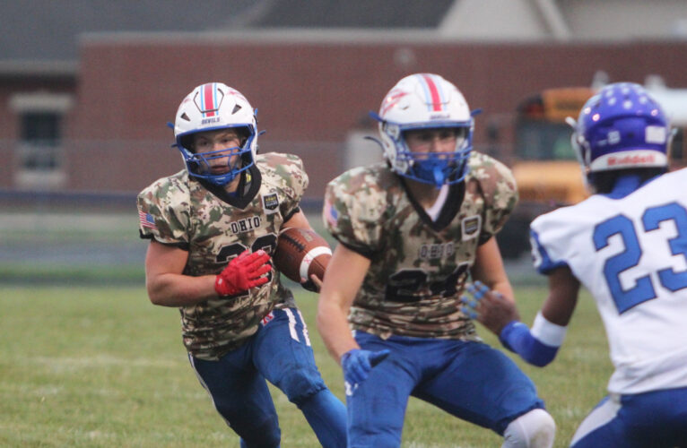 Western Reserve tackles Trinity 33-18, earns first win